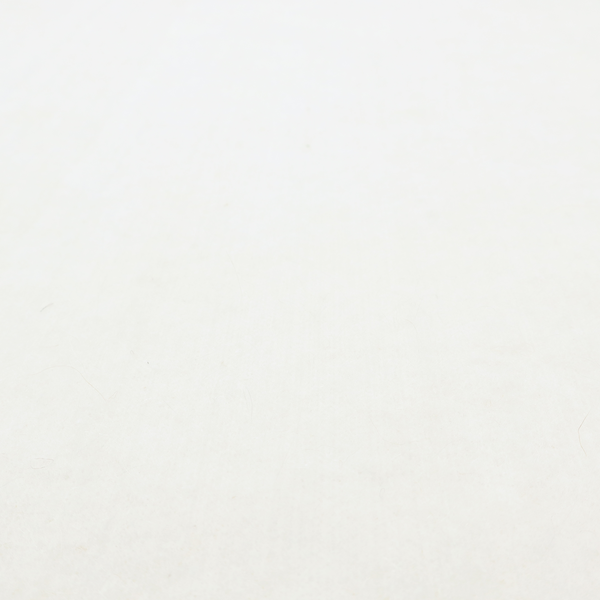 A white Crib 5 barrier felt showing a smooth, dense fabric surface.