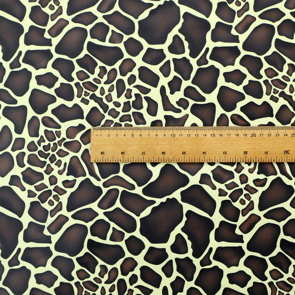 A seamless, repeating fabric pattern featuring a brown and cream giraffe print with a textured, leather-like finish on the dark spots.