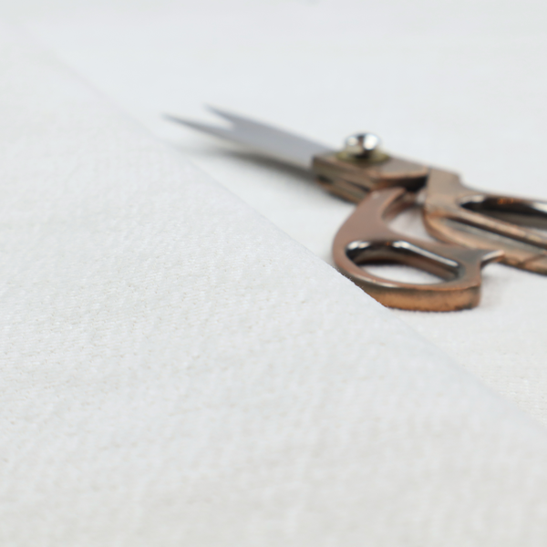 A off-white fabric with a prominent horizontal ribbed texture. The weave features thicker, raised cream threads that create a subtle striped effect on a matte, textured surface, ideal for modern interior design.