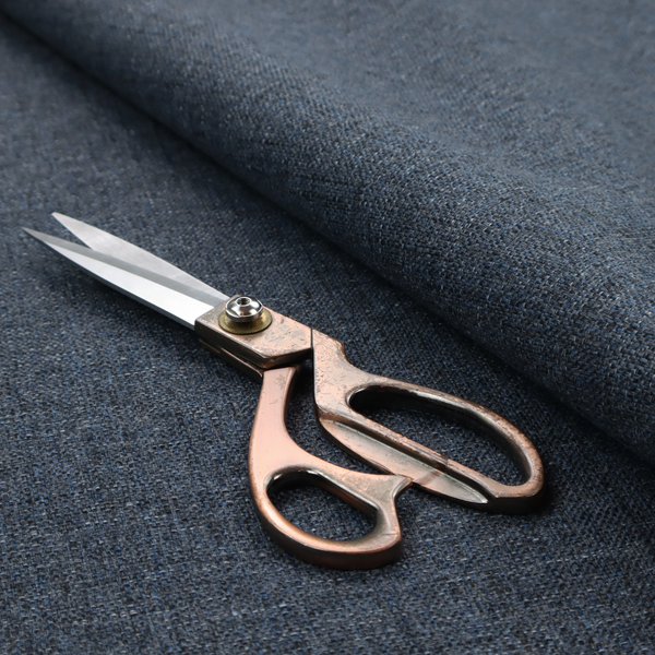 A navy blue woven fabric with a multi-tonal, heathered texture.