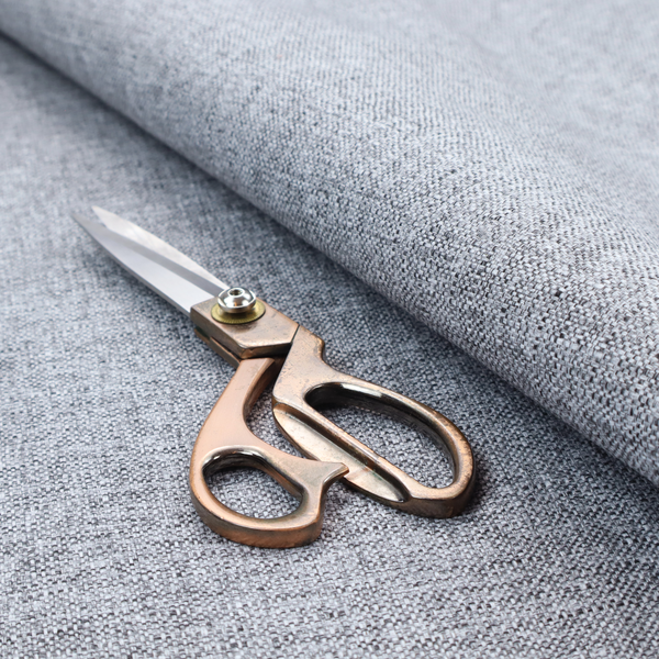 A slate grey woven fabric with a dense, multi-tonal heathered texture.