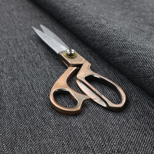 A black and grey woven fabric with a tight, salt-and-pepper heathered texture.