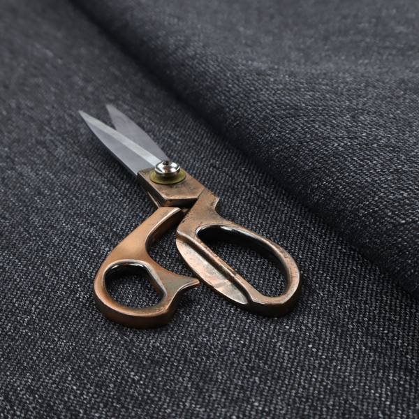 A deep onyx black woven fabric with a fine, heathered texture.