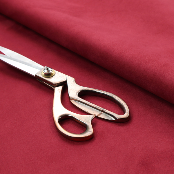 Annecy Water Repellent Velvet in Wine. The fabric features a dense, plush pile with a soft matte finish in a rich, vibrant crimson-red tone. This high-performance upholstery material offers a luxurious feel and a specialized water-resistant coating for superior durability and style.