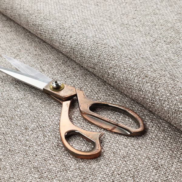 A tightly woven fabric in a neutral, multi-tonal light grey and off-white blend, featuring a distinct, structured basket-weave pattern.