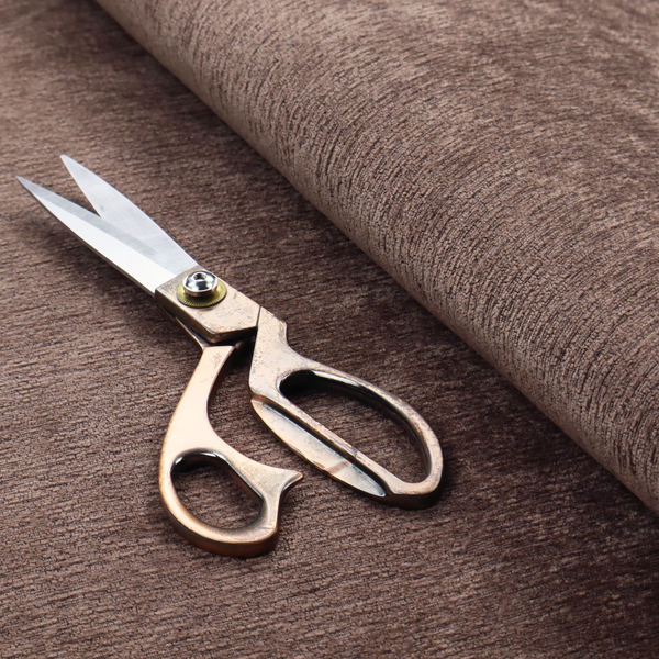 A rich, deep chocolate-brown weave with a sophisticated, textured finish. It is crafted with a dense, nubby construction that creates a subtle horizontal ribbing effect, providing both visual depth and a tactile, grounded feel.