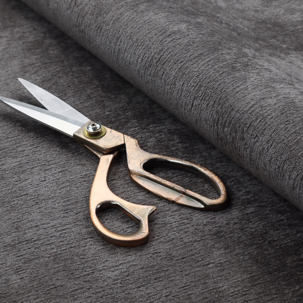 A deep, sophisticated charcoal-grey weave. It is constructed with a dense, nubby texture that creates a subtle, consistent horizontal ribbing effect, providing significant visual depth and a substantial, premium feel.
