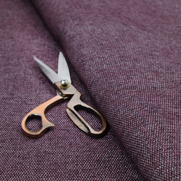 A rich plum purple woven fabric with a fine, heathered texture.
