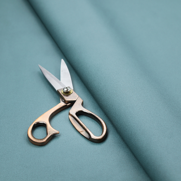 Plain, solid blue-coloured Hallstatt faux leather fabric texture with a smooth, fine finish.