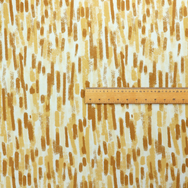 A textured abstract pattern featuring vertical brushstrokes or chalk-like marks in shades of warm mustard yellow and golden brown against a light off-white or cream background.