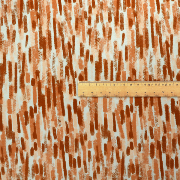 A textured abstract pattern featuring vertical brushstrokes or chalk-like marks in shades of warm terracotta and burnt orange against a light off-white or cream background.