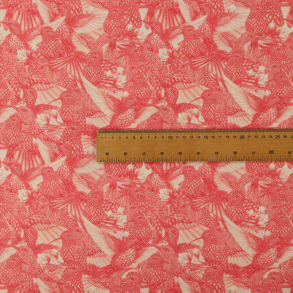 This fabric is saturated with pink illustrative hummingbirds.