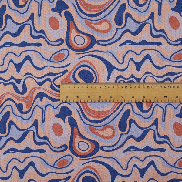 A repeating textile design with a psychedelic, mid-century modern aesthetic. The pattern consists of flowing, organic "liquid" lines and nested concentric shapes resembling a topographical map or marbleized paper. Colours include deep navy blue, warm terracotta, soft peach, and periwinkle.