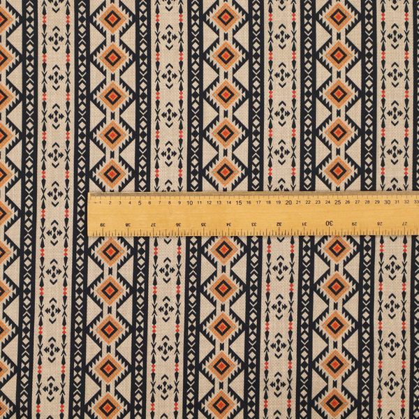 Intricate tribal border print arranged in vertical columns on a visually textured, linen-look base. The design includes repeating rows of rust-orange diamonds, black zig-zags, and arrow-like geometric motifs with a hand-drawn aesthetic.