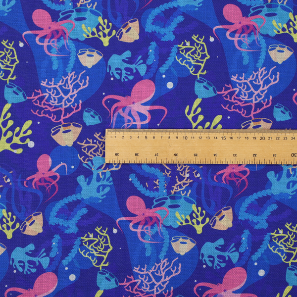 A vibrant nautical pattern featuring pink octopuses, yellow coral branches, and textured sea sponges set against an electric indigo blue background.