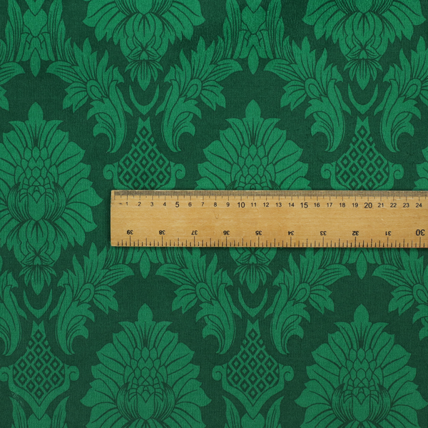 Deep emerald green damask fabric featuring a large-scale, repeating floral and acanthus leaf pattern in a rich tonal colourway.