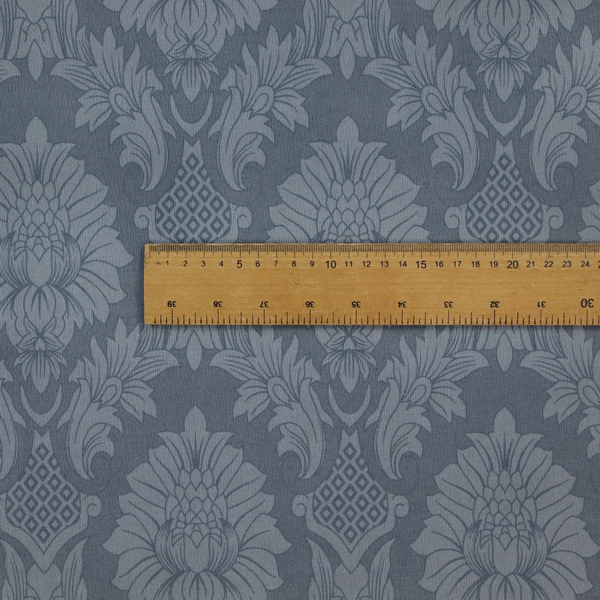 Sophisticated slate blue damask fabric featuring a large-scale, repeating floral and acanthus leaf pattern in a tonal, steel grey colourway.