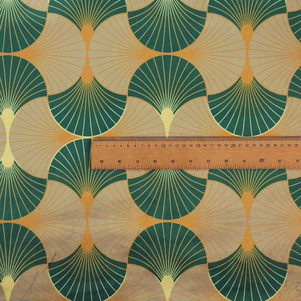 The DP-384-1 fabric showcases a sophisticated Art Deco aesthetic through a rhythmic, interlocking scalloped fan motif. This geometric pattern features a balanced, three-tone colour scheme: deep forest green provides bold structure, a warm taupe or sand neutral adds earthy softness, and muted gold accents highlight the radiating lines and central focal points.
