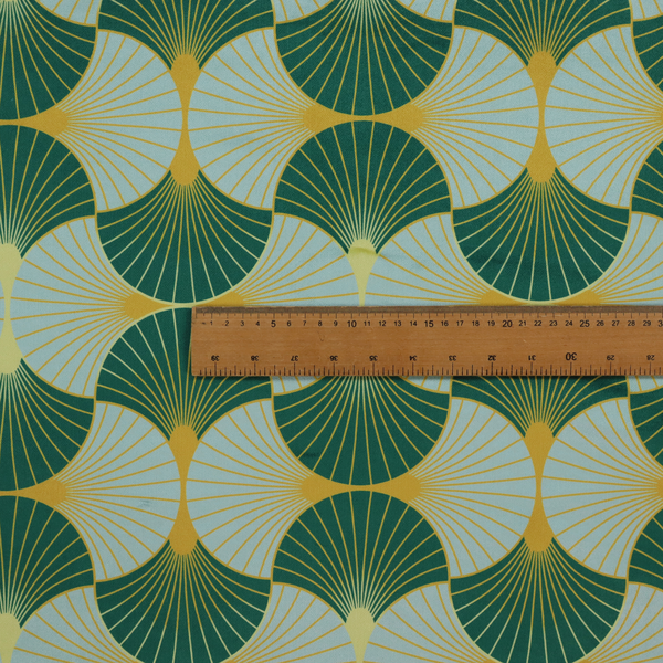 The DP-390-1 fabric offers a fresh and airy take on the classic Art Deco aesthetic, utilizing a cool-toned palette that lightens the geometric structure.