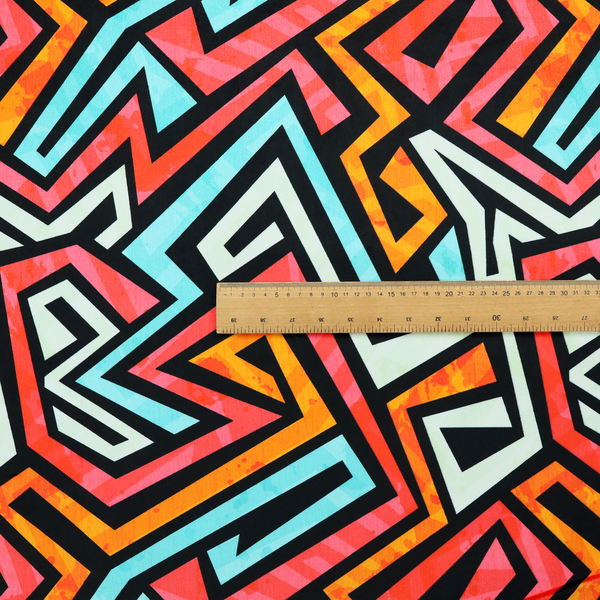 A bold, abstract geometric pattern with a vibrant, interlocking maze-like design.