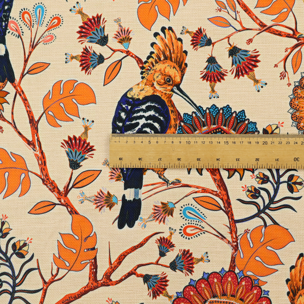 A striking botanical pattern featuring crested Hoopoe birds perched on winding orange branches with teal and terracotta floral blossoms on a warm cream background.