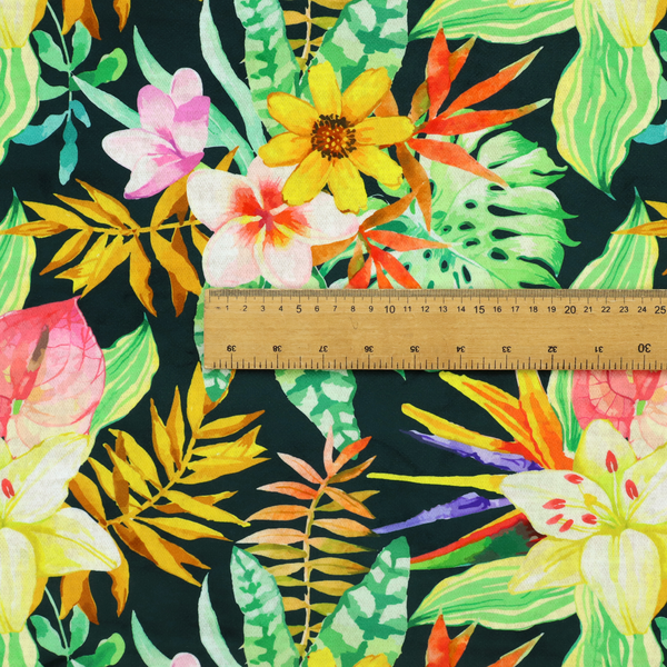 A vivid tropical botanical pattern featuring lilies, birds of paradise, and pink plumeria blossoms set against lush green leaves on a deep midnight black background.