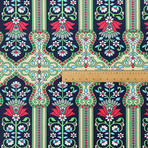 This fabric is a highly detailed, symmetrical textile pattern with a dark navy blue background. The design consists of repeating vertical floral motifs arranged in columns, separated by narrow, light-coloured striped bands.