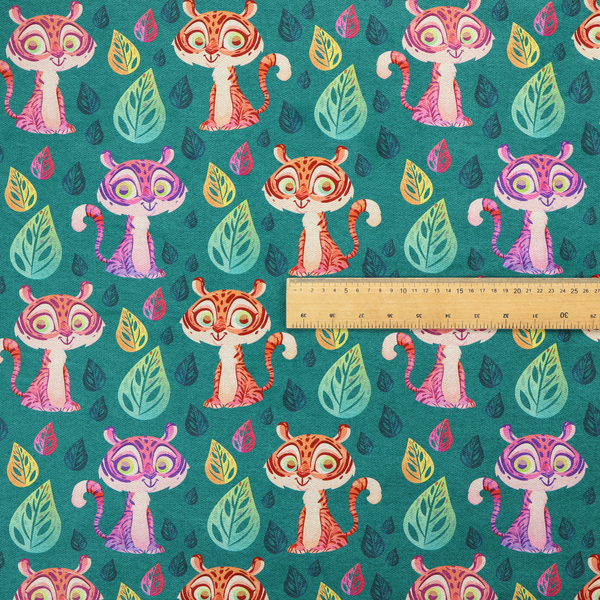 A teal fabric print featuring a whimsical, repeating pattern of cute, cartoon-style baby tigers and stylized leaves. The tigers are rendered in vibrant shades of pink, orange, and purple, while the leaves appear in varied hues, creating a playful and colourful jungle-themed aesthetic.