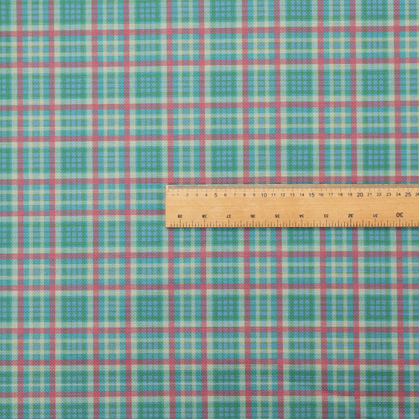 This fabric features a woven plaid pattern consisting of intersecting horizontal and vertical stripes in shades of teal, soft pink, light blue, and cream. The pattern creates a series of repeated squares and rectangles across the surface.