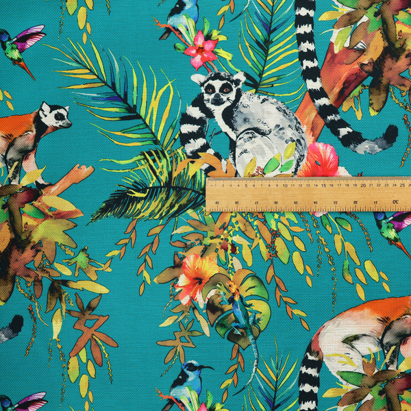 Playful tropical pattern featuring ring-tailed lemurs, hummingbirds, and exotic flowers amongst lush green foliage on a bright turquoise background.
