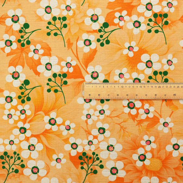 Retro floral pattern featuring delicate white flowers, green branching stems, and large orange botanical motifs set against a warm yellow background.
