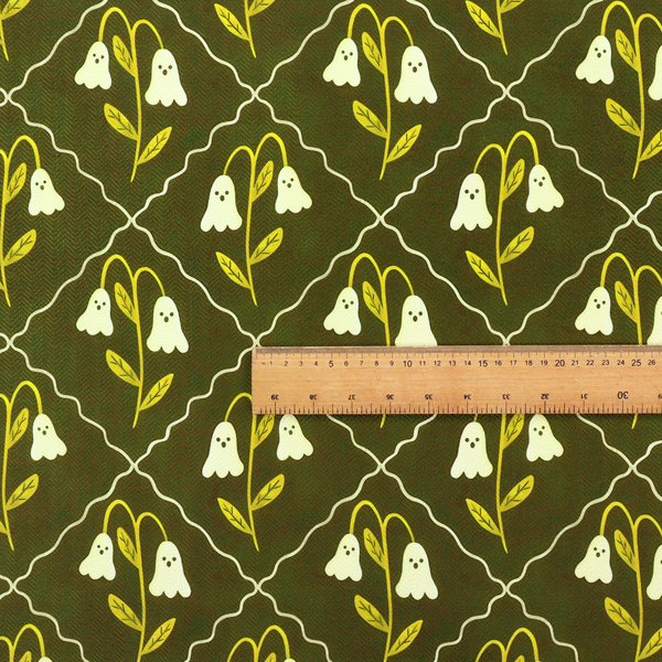 A dark olive-green vintage-style pattern featuring an ogee trellis grid framing whimsical, ghost-like floral blossoms with tiny faces.