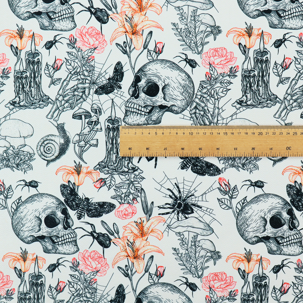 A hand-drawn, sketch-style pattern on an off-white background featuring human skulls, melting candles, spiders, moths, mushrooms, and floral elements like lilies and roses.