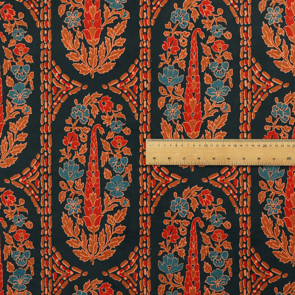 Ornate botanical paisley pattern with large vertical oval medallions filled with red floral motifs, orange leaves, and blue flowers, separated by decorative dashed stripes.