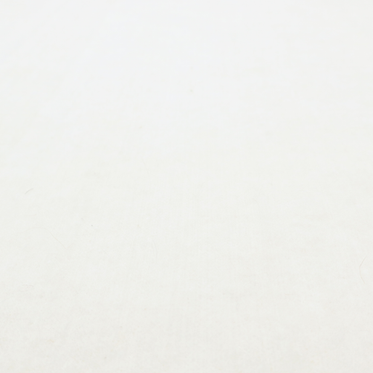 A white Crib 5 barrier felt showing a smooth, dense fabric surface.