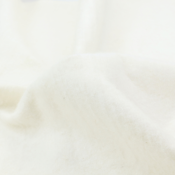 A white Crib 5 barrier felt showing a smooth, dense fabric surface.