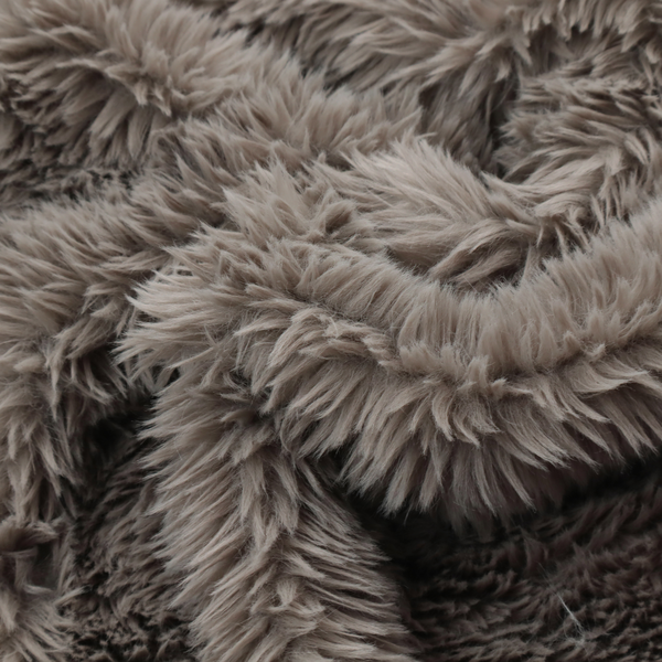 A cool-toned, greyish-brown or charcoal-taupe, high-pile faux fur fabric. It displays a dense, luxurious texture with soft, tousled fibres that create a cosy, shag-inspired look.