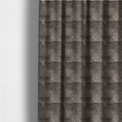 The fabric used to create these made-to-measure curtains is a cool-toned, greyish-brown or charcoal-taupe, high-pile faux fur fabric. It displays a dense, luxurious texture with soft, tousled fibres that create a cosy, shag-inspired look.