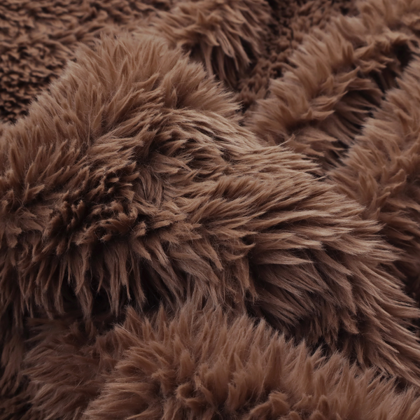 A deep, rich chocolate brown, high-pile faux fur fabric. It has a dense, luxurious texture with soft, tousled fibres that give it a warm and cosy shag-like appearance.