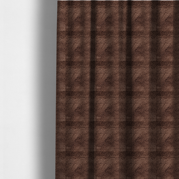 The fabric used to create these made-to-measure curtains is a deep, rich chocolate brown, high-pile faux fur fabric. It has a dense, luxurious texture with soft, tousled fibres that give it a warm and cosy shag-like appearance.