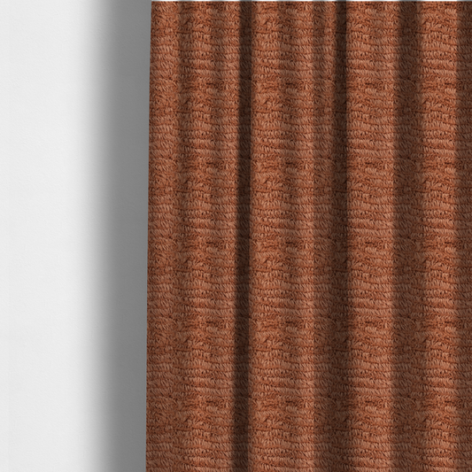 The fabric used to create these made-to-measure curtains is a rust or burnt-orange, high-pile faux fur fabric. It features a unique, wavy or rippled texture created by the directional alignment of the plush, soft fibres, giving it a distinctive shag-like appearance.