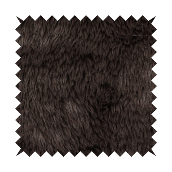 A deep, dark espresso or near-black, high-pile faux fur fabric. It displays a dense, luxurious texture with soft, slightly tousled fibres that create a cosy, sophisticated shag-like appearance.