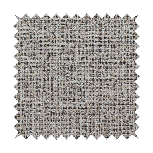 A textured, woven fabric featuring a complex pattern of beige, black, and white threads, creating a speckled and mottled appearance.