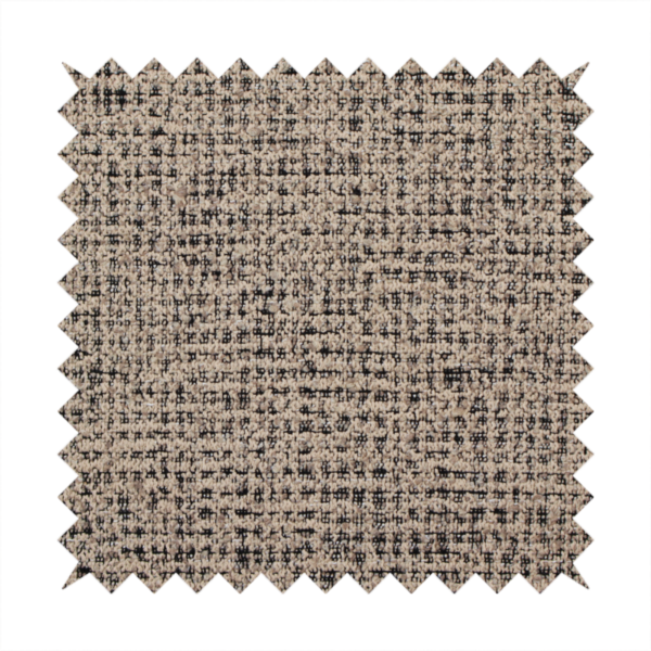 A textured, woven fabric featuring a complex pattern of beige, black, and white threads, creating a speckled and mottled appearance.