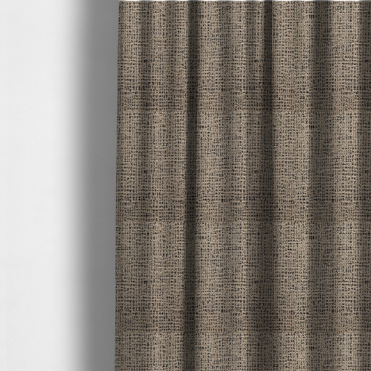 The fabric used to create these made-to-measure curtains is a textured, woven fabric featuring a complex pattern of beige, black, and white threads, creating a speckled and mottled appearance.