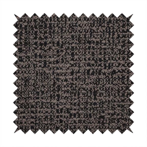 A textured, woven fabric featuring a complex pattern of dark brown, black, and beige threads, creating a speckled and mottled appearance.