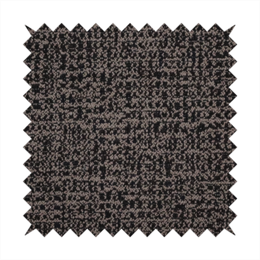 A textured, woven fabric featuring a complex pattern of dark brown, black, and beige threads, creating a speckled and mottled appearance.