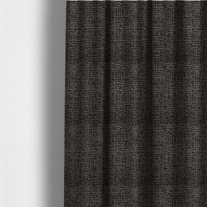 The fabric used to create these made-to-measure curtains is a textured, woven fabric featuring a complex pattern of dark brown, black, and beige threads, creating a speckled and mottled appearance.