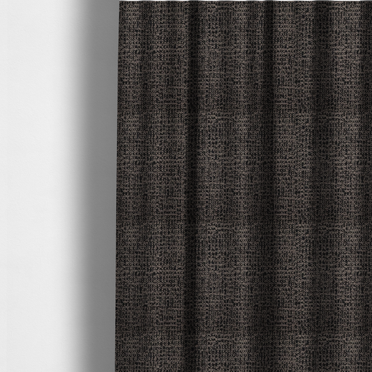 The fabric used to create these made-to-measure curtains is a textured, woven fabric featuring a complex pattern of dark brown, black, and beige threads, creating a speckled and mottled appearance.