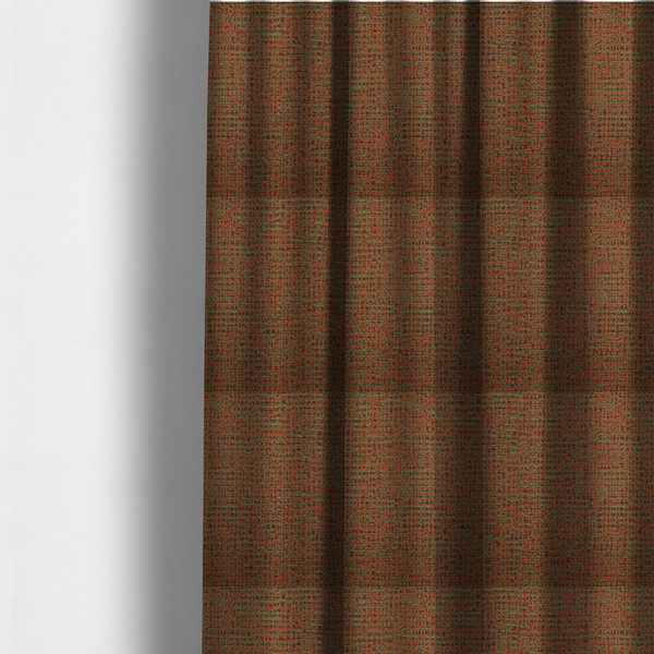 The fabric used to create these made-to-measure curtains is a textured, woven fabric featuring a complex pattern of red, green, and dark threads, creating a speckled and mottled appearance.